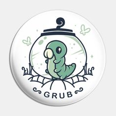 a green bird sitting on top of a white button with the words grub in it