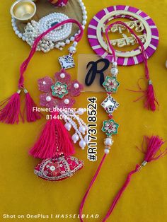 various items are displayed on a yellow tablecloth with the words, flowers and accessories