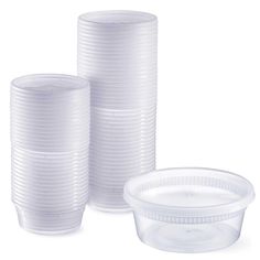 plastic cups with lids are stacked on top of each other, ready to be used