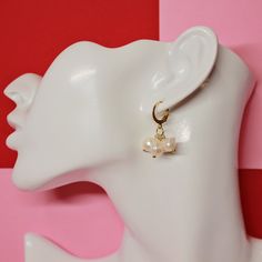 Meet our dainty 18K Stainless Steel Freshwater Pearl Huggie Earrings. She's made with a pair of 18K gold plated huggies with freshwater pearl accents. She's the perfect accessory for a minimalist gal.  handmade tarnish-resistant hypoallergenic All necklaces, bracelets, and anklets are made out of 18k gold stainless steel chains and/or components. All earring components are made out of 18K gold plated stainless steel.  Each purchase includes a velvet pouch for you to store your jewelry in, cleaning cloth, butterfly stickers, & butterfly keychain. It is recommended to keep your jewelry stored in your pouch to preserve its beauty.  All images were taken and edited by me. Gift Yellow Gold Huggie Earrings With Pearl Charm, Yellow Gold Huggie Earrings With Pearl Charm As Gift, Gold Hypoallergenic Pearl Huggie Earrings, Hypoallergenic Huggie Pearl Earrings Gift, Pearl Huggie Earrings As Gift, Pearl Drop Huggie Earrings As Gift, Cloth Butterfly, Stickers Butterfly, Butterfly Keychain