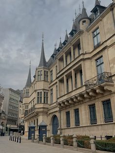 an old building with many windows and towers