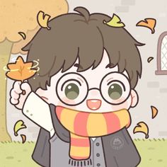 a young boy wearing glasses and a scarf with autumn leaves flying around his head in front of him