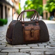 Esparza Duffle Bag - Premium Luxury Travel from Que Shebley - Shop now at Que Shebley Leather Duffle Bag With Top Carry Handle For Trip, Luxury Travel Bag With Leather Backing For Trips, Classic Weekender Bag With Leather Backing For Trips, Leather-lined Tote Travel Bag For Trips, Rectangular Leather Weekender Bag For Travel, Leather-backed Travel Briefcase Tote, Leather Weekender Bag With Top Carry Handle For Trips, Luxury Leather Trim Briefcase For Travel, Luxury Briefcase With Leather Trim For Travel