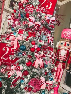 a christmas tree decorated with red and white ornaments