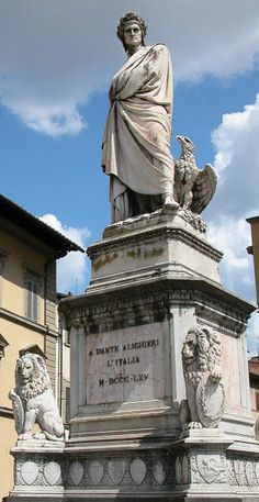 a statue is shown in front of a building