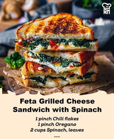 a grilled cheese sandwich with spinach on it