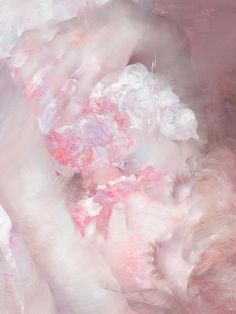 an abstract painting with pink and white colors on it's surface, including the hands