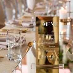 the table is set with silverware and place settings for an elegant dinner or reception