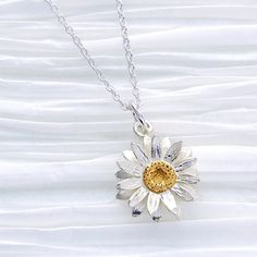 "Sterling Silver Flower Necklace, Daisy Necklace, Wildflower Botanical Jewelry, Floral Bloom Necklace, Mothers Flower Necklace, FREE SHIPPING This elegant 925 sterling silver flower necklace has a matte finish with a 14 karat gold plated center. It makes beautiful summer time necklace. OVERVIEW: * Beautiful, elegant, bright and sturdy 14, 16, 18, 20, or 22 inch 925 sterling silver chain. Choose from a 0.7 mm 925 sterling silver box chain, 1 mm petite 925 sterling silver cable link chain, petite Time Necklace, Sterling Silver Flower Necklace, Daisy Pendant, Silver Flower Necklace, Swarovski Crystal Hearts, Silver Gift Box, Daisy Necklace, Botanical Jewelry, Floral Necklace