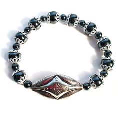 Nwot: Sliver Plated Metal Star And Hematite Beaded Stretch Bracelet. Brand: Handmade By Emrespect135. Size: 7" Material: The Star Is Silver Plated Metal 1 1/2" Wide. Hematite Beads Are 8mm And 10mm. The Bracelet Is Strung On A 0.8mm Durable Strong Stretch Resistant Flexible Stretchy Cord. The Hematite Beads Are Incased In Filigree Bead Caps. Metal Star, Metal Stars, Hematite Beads, Beaded Stretch Bracelet, Bead Caps, Stretch Bracelet, The Star, Stretch Bracelets, Womens Jewelry Bracelets