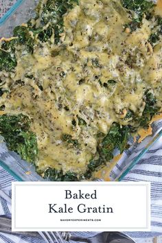 baked kale gratin in a glass casserole dish on a blue and white towel