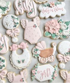 baby shower cookies decorated with pink and white icing