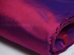 80 gsm Iridescent Indian Pure Silk Fabric by the yard Light Weight Soft Silk Curtains Scarf Costume Apparel Wedding Evening Dresses Dolls. ➤code: s70-2 ➤color: Iridescent Red Blue (80gsm) ➤Listing by the yard. ➤Width: 44 inches This iridescent soft light weight silk fabric has cross silk threads of Red and Blue color which makes it absolutely beautiful. The fabric is great for bridal & bridesmaids dresses, drapery, quilting, pillows, & chair upholstery, Dresses, Tops, Blouses, Jackets, Crafting, Wedding Evening Dresses, Sewing Wedding Dress, Silk Curtains, Yard Lights, Bridal Bridesmaid Dresses, Easy Stitch, Wedding Dress Fabrics, Evening Dresses For Weddings, Indian Fabric