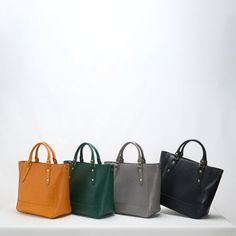 The eco-friendly dyeing process makes it more durable and comfortable.Made of high quality imported first layer cowhide, soft and fine. Minimalist, slouchy and versatile. Color: black, dark green, sunset yellow, Morandi grayMaterial: vegetable tanned Cowhide leatherInner material: cotton clothShoulder strap: adjustable, detachableCarrying method: Diagonal straddle, single shoulder, hand carryStructure: 1 main pocket, 1 internal patch pocket, 1 zipper compartment Production Time: About 1-3 days ( Top Handle Smooth Grain Satchel For Shopping, Top Handle Satchel With Smooth Grain For Shopping, Smooth Grain Top Handle Satchel For Shopping, Handheld Textured Leather Satchel, Leather Satchel For Everyday, Soft Leather Satchel Backpack In Vegetable Tanned Leather, Top Handle Leather Backpack For Daily Use, Leather Bag With Smooth Grain, Everyday Rectangular Textured Leather Satchel