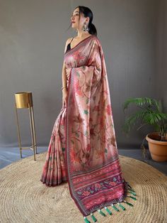 Add a touch of elegance and charm to your ethnic wardrobe with our attractive peach kalamkari printed silk traditional saree with blouse. This stunning saree features a beautiful peach color silk material adorned with intricate kalamkari print work, giving it a traditional and timeless appeal. The saree also comes with attached tassels on the pallu, adding a touch of sophistication to your attire.
Not only does this saree look aesthetically pleasing, but it also offers a range of benefits that m Bohemian Pre-draped Cotton Silk Saree With Kalamkari Print, Luxury Silk Pre-draped Saree With Kalamkari Print, Luxury Pre-draped Saree In Kalamkari Print Raw Silk, Bohemian Kalamkari Print Pre-draped Cotton Silk Saree, Luxury Traditional Kalamkari Print Pre-draped Saree, Engagement Gown, Kalamkari Print, Lehenga Crop Top, Lehenga Choli Wedding