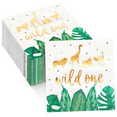 two paper napkins with gold foil animals and the words wild one on them