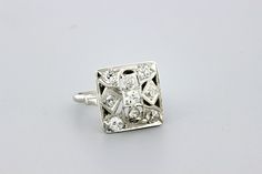 This fantastic ring is made in brilliant 14K white gold with dazzling pave set diamonds. This Mosaic square styled cocktail ring is set with 0.75ct total weight in white diamonds. The head of the ring is 16.22mm wide 16mm long and sits 6mm tall. The ring is a size 7.75 and can be resized upon request. B955FYSPD --Please reference our policy for more details-- For International orders, please provide a phone number for shipping purposes. Just place a note in the comment box during check out.Thank Square Cut Single Diamond Ring In Fine Jewelry Style, Square Cut Diamond White Ring, Diamond White Rectangular Platinum Diamond Ring, Diamond White Platinum Square Cut Diamond Ring, Rectangular Diamond Ring With Vvs Clarity, Platinum Square Cut Diamond Ring In Diamond White, White Square-cut Single Diamond Rings, Square Cut Diamond Ring With Vvs Clarity, Anniversary Square Cut Single Diamond Ring