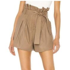 New With Tags Chic Designer High-Waisted Jaira Paper Bag Shorts From Lamarque. Size Xs. Buttery-Soft Leather Lined With Gold Poly-Satin. Belted At Waist. Pockets! "Desert" Color: Dark Beige/Tan. Snap & Button & Zip Fly. Approx Measurements Flat: Waist 14'' Rise 15'' Inseam 3'' *No Stretch* Interested But Don’t Have A Poshmark Account? Get $10 Off Your First Order When You Sign Up Using Code Rowanberry Chic Brown Shorts For Day Out, Chic Beige Bermuda Shorts, Chic Neutral Shorts For Day Out, Chic Beige Shorts, Chic Brown Belted Bottoms, Beige Paperbag Waist Shorts For Workwear, Chic Brown Paperbag Waist Bottoms, Chic Brown Shorts For Workwear, Chic High Waist Brown Shorts