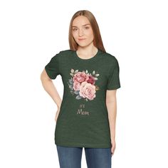 This classic Women's short sleeve tee "#1 Mom Vintage Floral 3" fits like a well-loved favorite. Soft cotton and quality print make users fall in love with it over and over again. These t-shirts have-ribbed knit collars to bolster shaping. The shoulders have taping for better fit over time. Dual side seams hold the garment's shape for longer. .: 100% Airlume combed and ringspun cotton (fiber content may vary for different colors) .: Light fabric (4.2 oz/yd² (142 g/m .: Retail fit .: Tear away label .: Runs true to size T Shirt Flowers, Womens Jersey, Floral Shirt, Jersey Shorts, Cotton Fiber, Vintage Floral, Pink Floral, Mother Gifts, Light Fabric