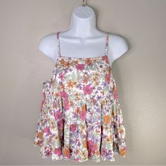 (Nwt!) Peach Love California “The Lucy” Floral Tiered Tank. Size Medium. Sleeveless. Tiered. White/Orange/Purple/Green Floral Print. Keyhole With Button Closure In Back. Excellent Condition-New With Tags. See Pictures. Feminine Flowy Tank Top For Summer, Flowy Feminine Tank Top For Summer, Flowy Feminine Summer Tank Top, Feminine Spring Beach Tank Top, Feminine Floral Print Tank Top For Brunch, Spring Floral Print Tank Top For Brunch, Floral Print Tank Top For Spring Brunch, Pink Flowy Sleeveless Top, Pink Top For Summer Garden Party