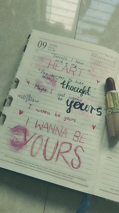 an open notebook with writing on it and a pencil next to it that says, i wanna be yours