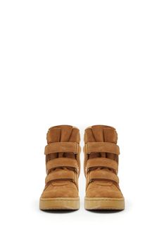 Brown suede design Front strap closure 50 mm wedge heel Logo on the heel Inserted design Regular fitComposition: 100% Leather Isabel Marant Sneakers, Parisian Look, Wang Dress, Rick Owens Jacket, Versace Shirt, Margiela Shoes, Versace Sweatshirt, Gucci Hat, Marine Serre