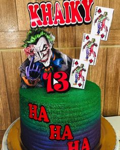 a birthday cake that has been decorated with the joker