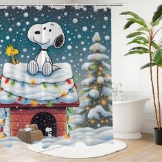 a shower curtain with a snoopy dog on top of a house in the snow