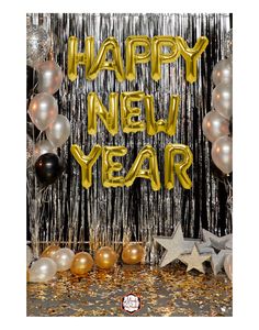 happy new year balloons and streamers in gold, silver and black colors on a table