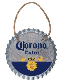 a bottle cap hanging from a rope with the word corona extra on it's side