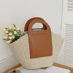 Stylish Casual Straw Summer Handbag – 2YZ Shop Spring Shopping Jute Shoulder Bag, Cream Bags With Bamboo Handle For Spring, Chic Natural Color Handheld Straw Bag, Spring Cream Bag With Bamboo Handle, Trendy Beige Bags In Natural Fiber, Trendy Jute Straw Bag For Shopping, Chic Beige Straw Crochet Bag, Cream Handheld Straw Bag For Spring, Chic Beige Shoulder Bag In Natural Fiber