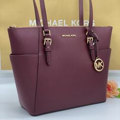 Michael Kors Charlotte Large Top Zip Tote Dark Cherry Top Zip Tote New With Tags Color: Dark Cherry Gold Tone Hardware Saffiano Leather Exterior: 2 Slip Pockets Interior: 1 Zip Pocket, 2 Slip Pockets Approx. 11”Bottom-15”Toplx10”Hx4.5”D Handles Approx. 9.5” Grey Tote Bags, Large Leather Tote Bag, Grey Tote, Michael Kors Tote Bags, Bags Michael Kors, White Tote Bag, Nylon Tote Bags, Large Leather Tote, White Tote