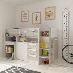 a child's room with a book shelf, desk and toy bike on the floor