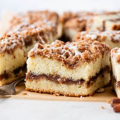 a close up of a piece of cake on a cutting board