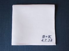 White linen pocket square with monogram. Remember the date, add it on the pocket square for the groom to wear on wedding day. Pocket square: 12x12inches square (you may request a different size) Hemmed and machine stitched White linen Navy blue thread (we have other colors,please contact us with your request) FONT OPTIONS: Choose a font Please leave the initials and date with your order. Request a different embroidery by contacting the shop. **CUSTOM ORDERS ARE WELCOME** **PLACEMENT INFORMATION* Elegant Personalized Handkerchief For Bridesmaid Gift, Elegant Customizable Handkerchiefs For Bridesmaid Gift, Classic Rectangular Handkerchiefs For Gifts, Classic Rectangular Handkerchiefs As Gifts, Elegant Customizable Handkerchiefs For Personalized Gifts, Elegant White Handkerchiefs For Personalized Gift, Classic Wedding Pocket Square Handkerchief, Classic Handkerchiefs With Initials For Wedding Gift, Elegant Handkerchiefs With Initials For Wedding Gift