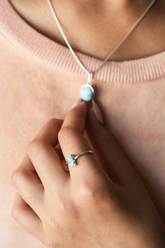 Our Larimar Ring is one of a kind with just the right size for that pop of color. It comes with two Larimar stones set in a prong setting. Larimar's are rare stones born out of volcanic fire and water and mined only in the Dominican Republic. Larimar gems have soft Caribbean blue color and white marbling that signify the very highest AAA quality. Each stone is unique in its color, shade, and character. These Larimar stones are carefully handpicked to ensure the high-grade quality. D E T A I L S Everyday Sterling Silver Turquoise Ring, Sterling Silver Moonstone Ring For Everyday, Minimalist Sterling Silver Opal Ring, Dainty Sterling Silver Moonstone Ring, Dainty Sterling Silver Turquoise Gemstone Ring, Minimalist Sterling Silver Turquoise Ring, Minimalist Turquoise Ring In Sterling Silver, Dainty Sterling Silver Turquoise Ring, Sterling Silver Moonstone Ring With Birthstone