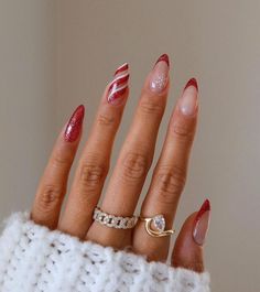 27 Candy Cane Nails That Are Oh So Sweet - Lifestyle With Amal Christmas Nail Sets Almond, Christmas Nail Design Almond Shape, Christmas Acrylics Almond, Christmas Nail Inspo 2024, Builder Gel Christmas Nails, Funky Christmas Nails Acrylic, Almond Nail Christmas Designs, Christmas Red And White Nails, Christmas Nails Round Shape