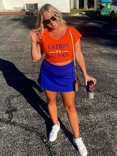 SHOP EXCLUSIVE STYLES AND PRODUCTS NOT SOLD ON ETSY! ORDER DIRECTLY FROM OUR WEBSITE AT www.lulugracedesigns.com AND RECEIVE 15% OFF YOUR FIRST ORDER USING CODE 150FF AT CHECKOUT!  This is perfect for our Gator fans! It's Gators vs All Y'all! You totally need this! *Style in the photo is the Ladies V-Neck Tee* These shirts come in a wide variety of styles and sizes. Please be sure to select the correct size and style from the style drop-down menu. We are not responsible for incorrect size or sty Gators Game Day Outfit, Stretch Tops With School Spirit For Summer, Spring Sports Event Tops, Summer Cheerleading Tops With School Spirit Style, School Spirit Tops For Summer Cheerleading, Summer School Spirit Tops For Cheerleading, Florida Shirt, Glitter Shirt, Glitter Top