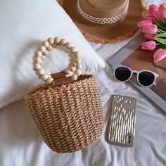 Elevate your summer style with our stunning Straw Weave Bucket Bag! 🌴 Handcrafted with paper straw, this chic accessory adds a touch of boho flair to any outfit. Whether you're strolling through the city streets or lounging on the beach, this versatile bag is a must-have for your wardrobe. Get yours today and embrace effortless elegance wherever you go! Trendy Summer Straw Bucket Bag, Chic Summer Straw Bag In Natural Fiber, Chic Summer Bags Made Of Paper Straw, Chic Natural Straw Bag For Summer, Casual Straw Bag For Summer Outings, Chic Natural Color Straw Bag For Summer, Spring Bohemian Jute Bags, Chic Summer Paper Straw Bags, Chic Woven Straw Bag For Summer