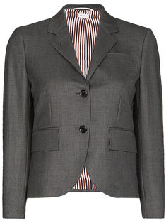 Grey wool single-breasted wool blazer from THOM BROWNE featuring signature grosgrain loop tab, RWB stripe lining, notched lapels, front button fastening, long sleeves, chest welt pocket, two side flap pockets, buttoned cuffs and English rear vents. | Thom Browne Single-Breasted Wool Blazer Thom Browne Suit, 23 Fashion, Fall 23, Versace Outfit, Fashion Me, Summer Beach Wear, Ballet Flat Shoes, Wool Blazer, Ski Wear