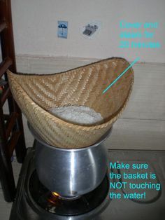 a bowl that is sitting on top of a stand with some salt in it and instructions to make sure the basket is not touching the water