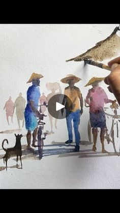 a person is painting people with umbrellas on the street while a dog walks by