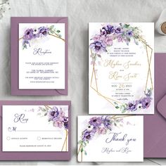 wedding stationery with purple flowers and greenery on the front, lavender envelopes and matching cards