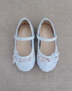 Delicate girls crochet lace ballet flats with added tulle bow. For flower girls, princess costumes and parties. DETAILS: COLORS AVAILABLE: White, Ivory, Dusty Pink, Light Blue UPPER: Synthetic upper and lining MATERIALS: Mandmade outsole ORIGIN: Imported STYLE NAME: PAS Not sure of which size to purchase? Shoes measurements are as follow: (Please note measurements taken the length of inside of shoe from toe to heel) Not sure of which size to purchase? Shoes measurements are as follow: (Please no Communion Shoes, Lace Ballet Flats, Blue Ballet Flats, Shoes Princess, Flower Girl Shoes, Bridal Flats, Wedding Shoes Bride, Satin Shoes, Wedding Guest Shoes