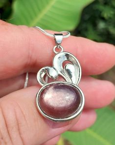 Gorgeous Purple Mica Bunny S925 Pendant and Necklace! Beautiful Purple/Pink, bright in color. With so much flash and sparkle its really gorgeous.   Definitely one of my favorite Jewelry pieces. Pendant is shaped like a Bunny head. Super cute design.  This stone is oval in shape, inlay setting with bail style connection. 100% Silver setting.  Comes with a Snake style chain with Lobster Clasp.  Size: 18 inch Box Chain Pick up this one of a kind Crystal Pendant Necklace today! I have other Necklace styles and sizes in this piece available on my page under the section "Jewelry" stop by and check them out! FREE GIFTS WITH EVERY PURCHASE! 🎁 Pink Cabochon Round Necklace, Pink Round Cabochon Necklace, Pink Sterling Silver Oval Pendant Jewelry, Pink Sterling Silver Jewelry With Oval Pendant, Handmade Pink Oval Pendant Jewelry, Pink Cabochon Necklaces For Jewelry Making, Pink Oval Sterling Silver Necklace, Pink Handmade Necklaces For Anniversary, Pink Sterling Silver Necklace Gift