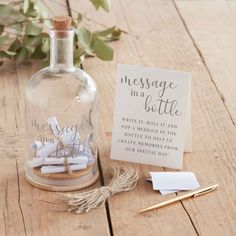 a message in a bottle next to a note and pen