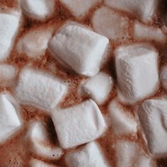 there are many pieces of marshmallows on the table