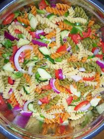 pasta salad with vegetables in a bowl ready to be eaten