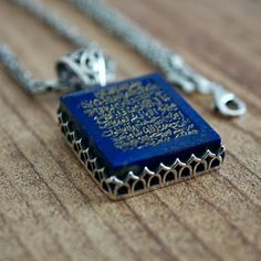 PENDANT: Lapis Lazuli(natural) METAL : .925 Sterling Silver DIMENSIONS : 24 x 22 mm CHAIN: Byzantine King chain METAL : .925 Sterling Silver LENGHT: 55 cm - 21inches THICKNESS: 2 mm What is engraved on the stone? There are certain verses in the Quran that were revealed by Allah to help guide us. They are so powerful that by simply reciting them you, your home and your family would be protected from many evils and from the powers of Shaitan.This verse is ayah 255 from Surah Baqarah commonly refer Surah Baqarah, Seal Of Solomon, Ayatul Kursi, Lapis Lazuli Pendant, The Throne, Hand Engraving, Artisan Jewelry, Lapis Lazuli, Allah