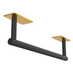 two black and gold metal brackets on a white background